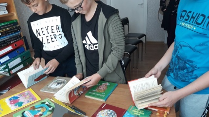 „Vytauto Račicko knygų skaitymas Dieveniškių bibliotekoje“
